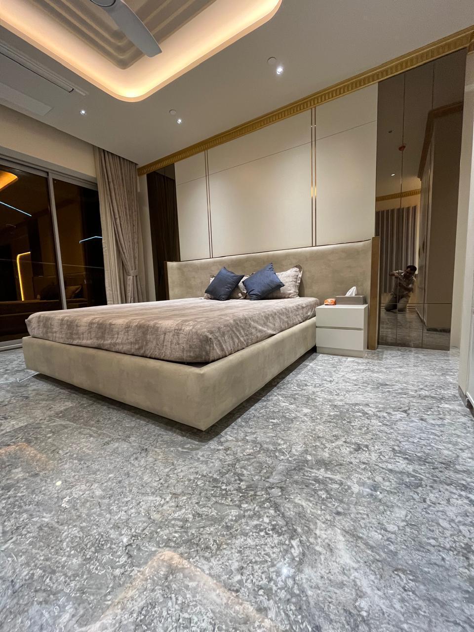 Master bedroom with gold trim panelling